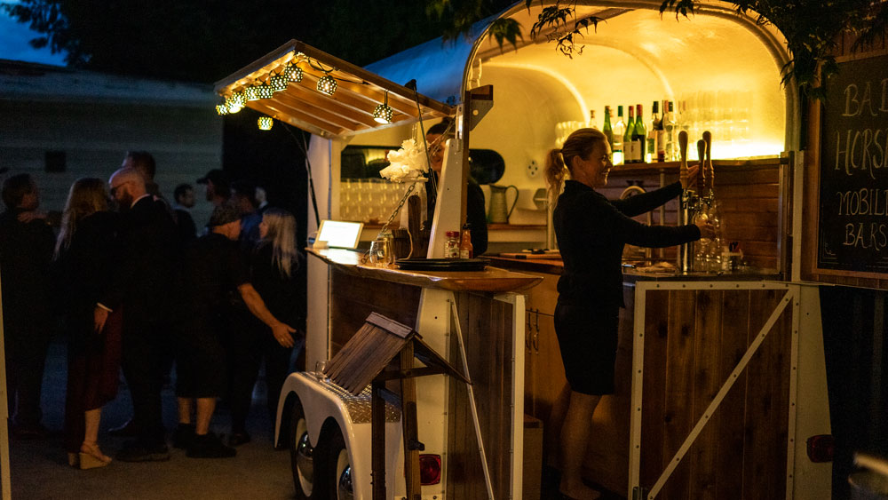 Pouring beer from tap in a party